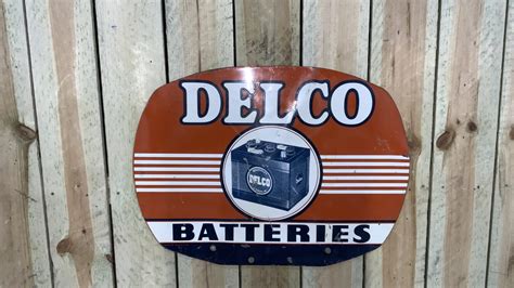 1953 delco batteries double sided tin sign for sale at the world s largest road art auction 2023
