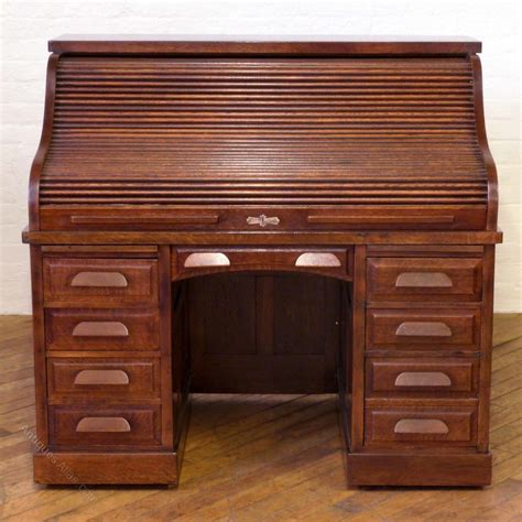 A desk or writing table can be an incredible piece of furniture, especially if you choose an antique item with a rich history behind it. Edwardian Oak Roll Top Desk - Antiques Atlas
