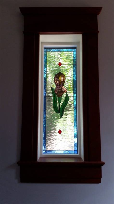 Stained Glass Window Insulated And Installed Into Vinyl Frames