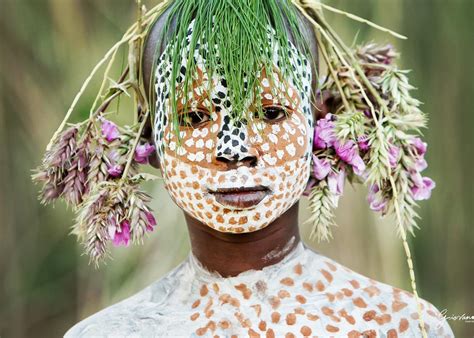 People From The Ethiopian Suri Tribe Wear Intricate Face Paint And Don B