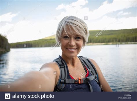 Hiking Blonde Woman Taking Photo Hi Res Stock Photography And Images