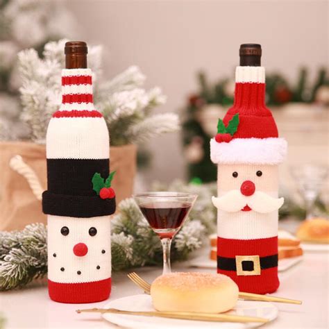 Whether a themed party or new year's eve, these champagne christmas decorations never fail to. Knitted Christmas Bottle Decorations Lovely Snowman Santa Claus Design Wine Bottle Cover Home ...