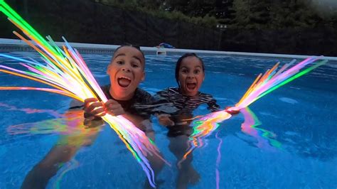 100 Glow Sticks In The Pool Famoustubekids Youtube