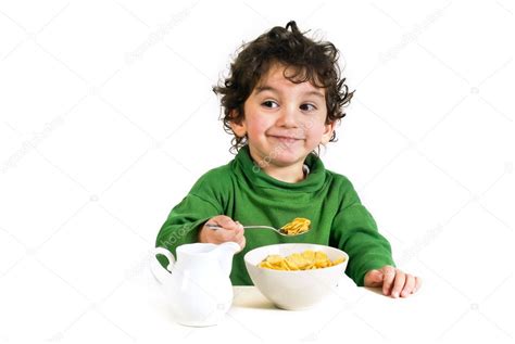 Kid Eating Cereals — Stock Photo © Noamarmonn 1340938