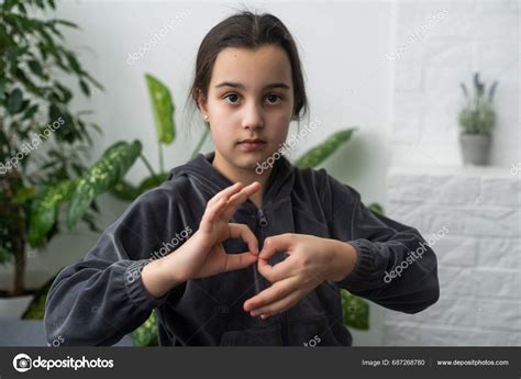 Beautiful Smiling Deaf Girl Using Sign Language Stock Photo By