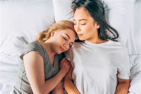 Free Photo Young Women Cuddling Sleeping In Bed