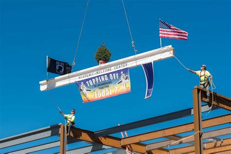 Topping Out Ceremony Celebrates Academic And Welcome Center · News