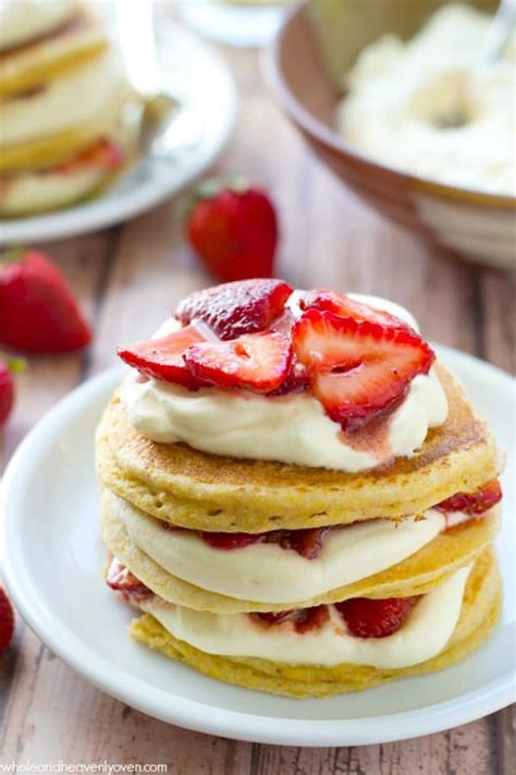 In a medium bowl combine the flour, baking powder, 2 tablespoons white sugar and the salt. Strawberry Shortcake Pancake Towers