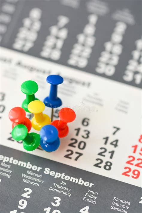 Multiple Pins On A Calendar Suggesting Busy Day Or Schedule Stock Image