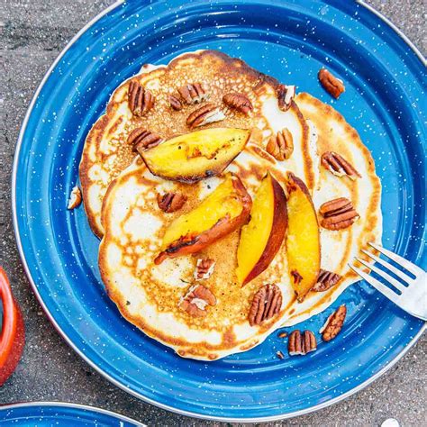 Pancakes With Campfire Grilled Peaches And Pecans Fresh Off The Grid