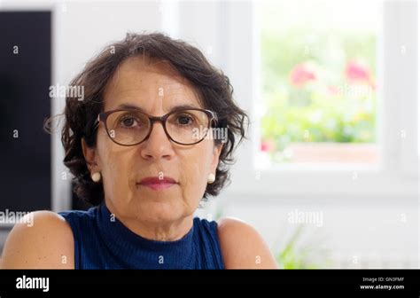 Portrait Of A Beautiful Mature Woman With Glasses Stock Photo Alamy
