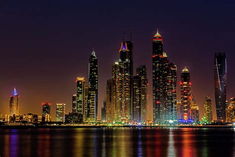 Dubais Skyline At Night Photograph By M Damien