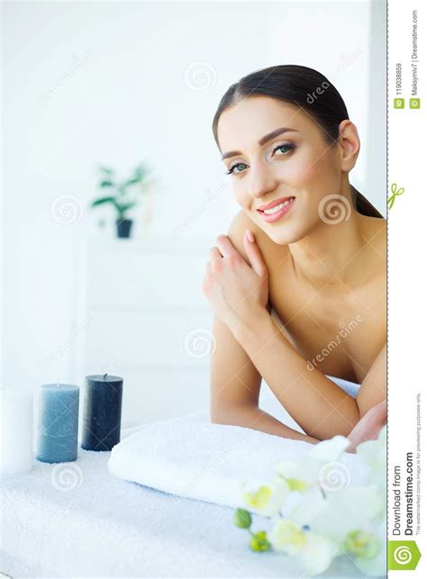 spa treatments beautiful woman in a spa salon relax and skin cleansing woman lying on a bed in