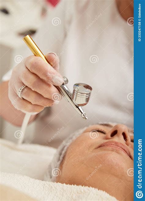 Lovely Woman Having Skincare Lifting Procedure In Cosmetology Clinic