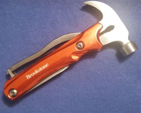 Brookstone 10n1 Multi Tool Hammer Wnail Claw And Plier Home Camping Auto