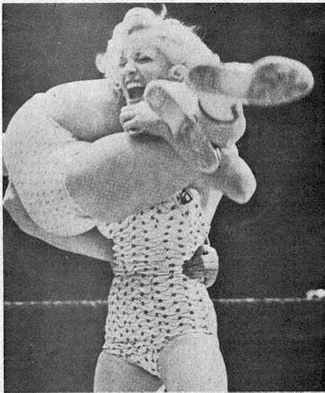 Headscissors Being Applied To Judy Grable Wrestling