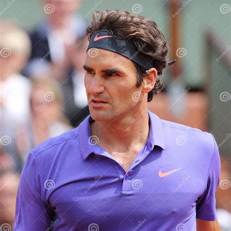 Seventeen Times Grand Slam Champion Roger Federer In Action During His