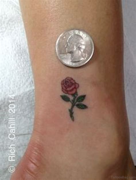 This small dainty rose flower covers the ring finger. 41Good Looking Rose Tattoos For Ankle