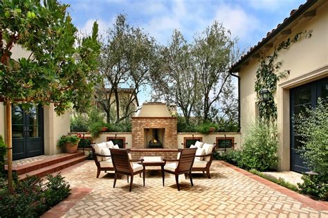 Weathered bricks, contemporary finishes, and exotic fittings combine for a distinctive patio designed to satisfy the dining and style needs of a busy modern family. Brick Patio Design - Beautiful Ideas | How To Build A House