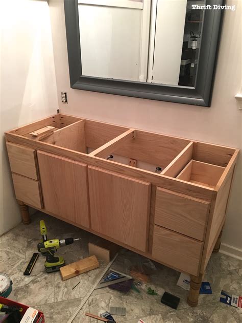 The base cabinets are exactly 12 feet long (four 36 inch cabinets) so we got a 1x12x12 board. Building a DIY Bathroom Vanity: Part 5 - Making Cabinet Doors