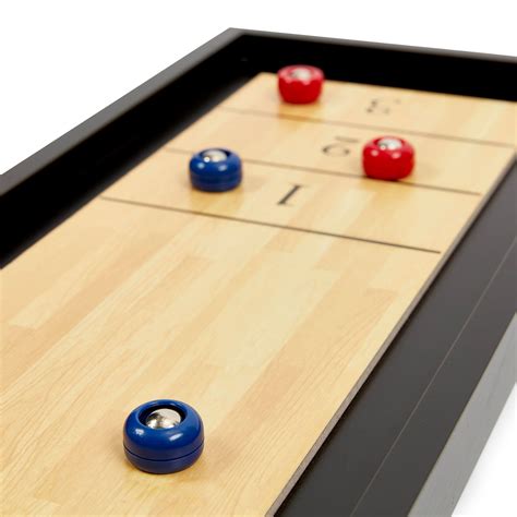 An Old Style Shuffle Board With Red White And Blue Balls
