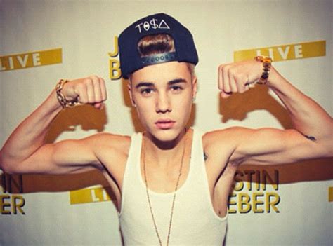 Justin Bieber Flexes Shows Off His Biceps E News