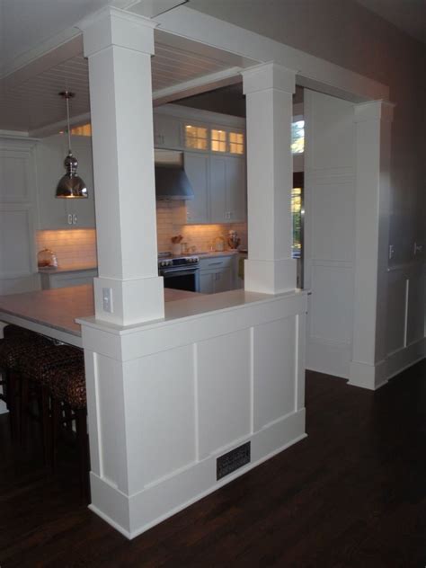 This also allowed us to keep the wall outlets so we. Half wall with pillars to separate an eat-in kitchen from ...