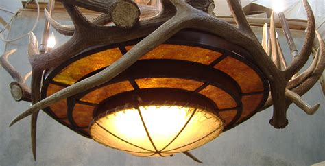 Castantlers offers an enormous selection of antler chandeliers, antler ceiling fans and many other we're your best source for rustic lighting including antler chandeliers, rustic ceiling fans, lodge. Large Mica Rawhide and Elk Antler Chandelier