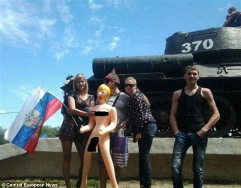 Student Arrested For Posing By Russian World War Two Memorial With An