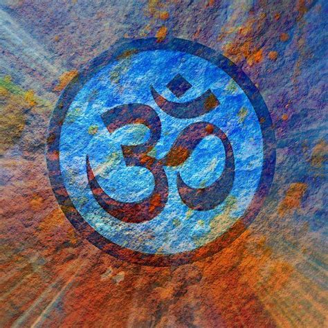 An Om Shan Symbol Painted On The Side Of A Building In Blue And Orange