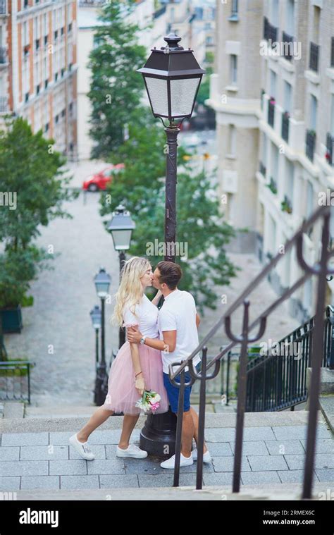 Romantic Couple Kissing On Montmartre In Paris France Stock Photo Alamy