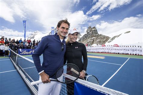 Ap Roger Federer In Match With Us Ski Racer Lindsey Vonn Atop The