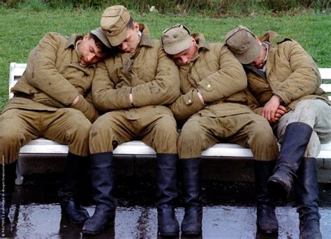 Soldiers After A V Day March Practice Taking A Nap On A Park Bench