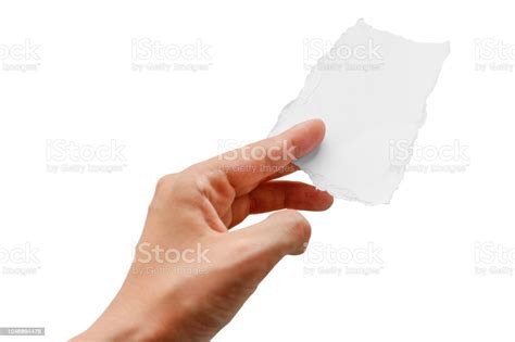 Hands Holding A Small Piece Of Paper Close Up Isolated On White