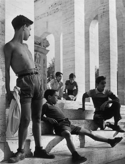 Youths On The Steps Of The Palazzo Della Civilta Del Lavoro In Rome