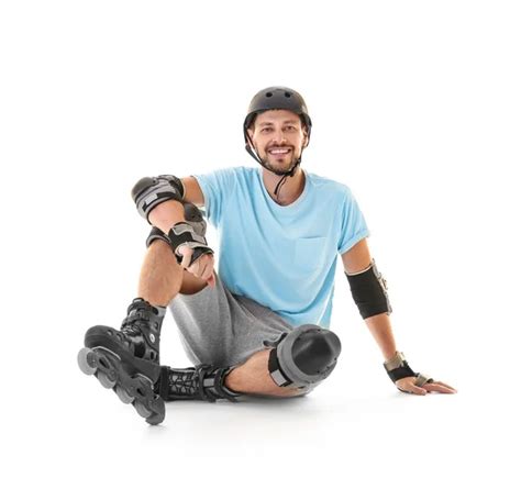 Handsome Man On Roller Skates — Stock Photo © Belchonock 171081524