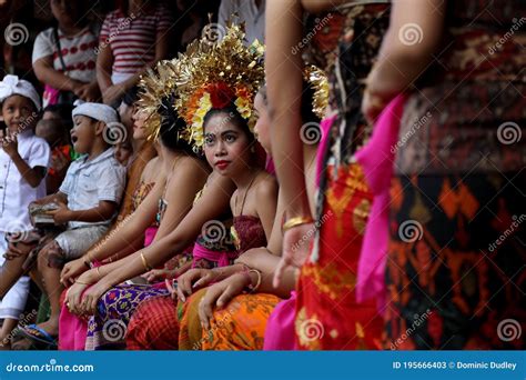 Local Girls With Ornate Gold Head Dresses In The Village Of Tenganan Bali During The Annual