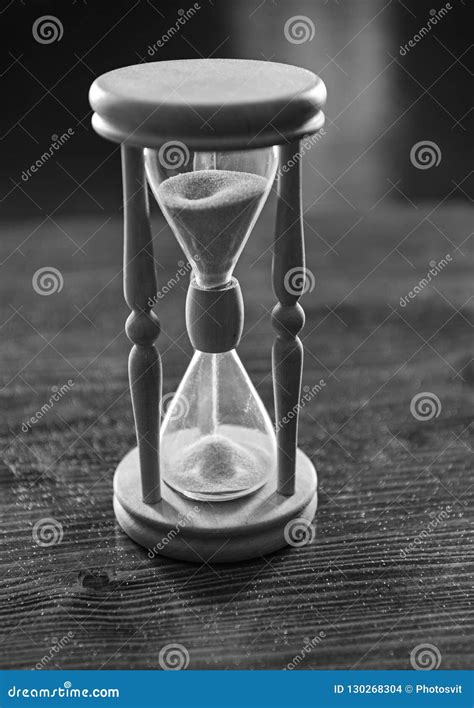 Hourglass On Wooden Table Dark Background Sand Falling Down Inside Of