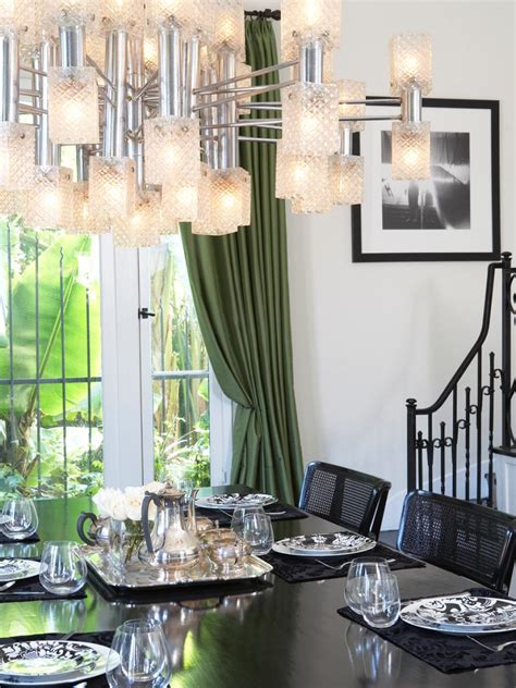 Dining Room With Black Dining Table And Funky Chrome Chandelier Hgtv