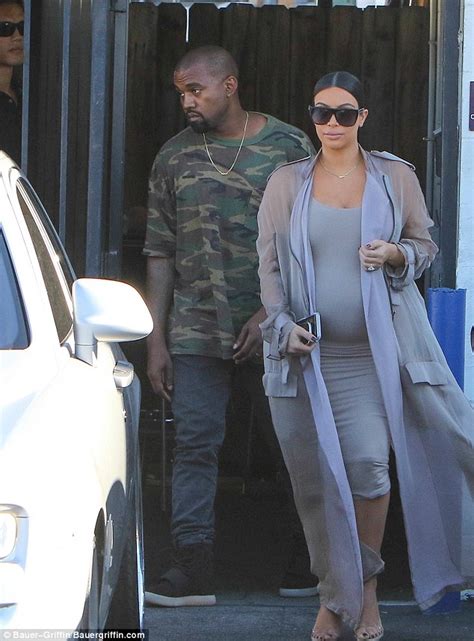 Kim Kardashian Puts Pregnant Belly On Display In Nude Dress With Kanye West Daily Mail Online