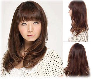 The ideal hair length for a round face is a short hairstyle because a short hairstyle makes an impression that your face and neck are long. Korean long hairstyles with bangs for round faces | Long ...