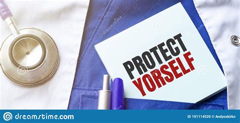 Stethoscope Pens And Note With Text Protect Yourself On The Doctor Uniform Stock Photo Image