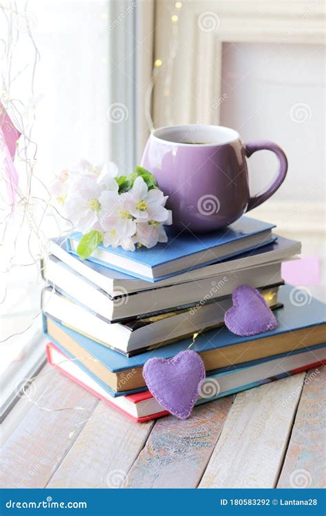 Cup Of Coffee A Stack Of Books Decorated With Hearts Apple Flowers On