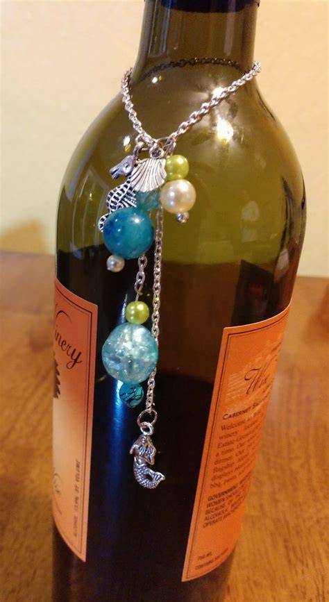 Pin By Wolftree Crafts And Creations On Wine Bottle Necklace Art Wine