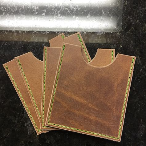 3 advertising , based in albuquerque, designed these ingenious business cards sleeves for photographer michael barley that we letterpress printed not long ago. Business Card Sleeve - Ozark Mountain Leather Works