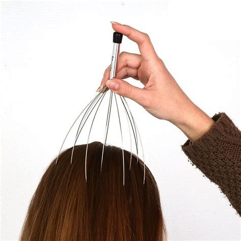 The Genie Handheld Portable Head And Scalp Massager