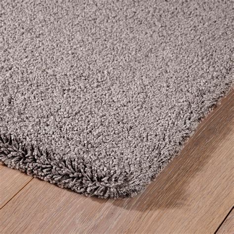 Moderne teppiche sind ein toller blickfang. Teppich aus Teppichboden (Auslegware) für glatten Fußboden