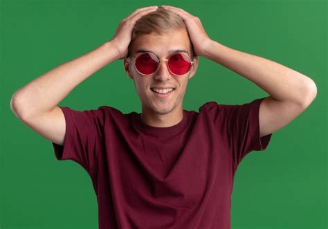 Free Photo Smiling Young Handsome Guy Wearing Red Shirt And Glasses