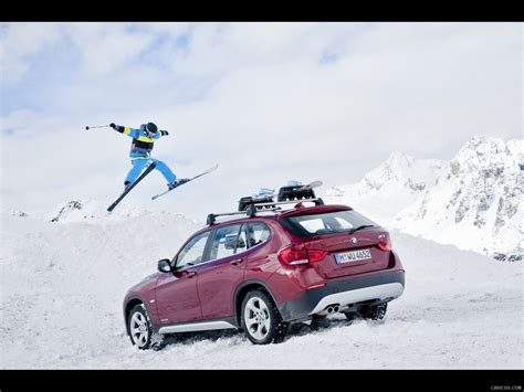 We haven't had a lot of snow yet but so far the all wheel drive seems to manage. BMW X1 xDrive28i (2011) - In Snow | Wallpaper #41