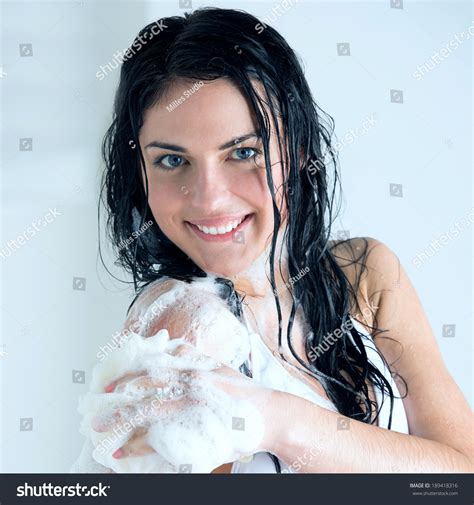 Young Woman Washing Body With Shower Gel At Home Or Hotel Imagen De